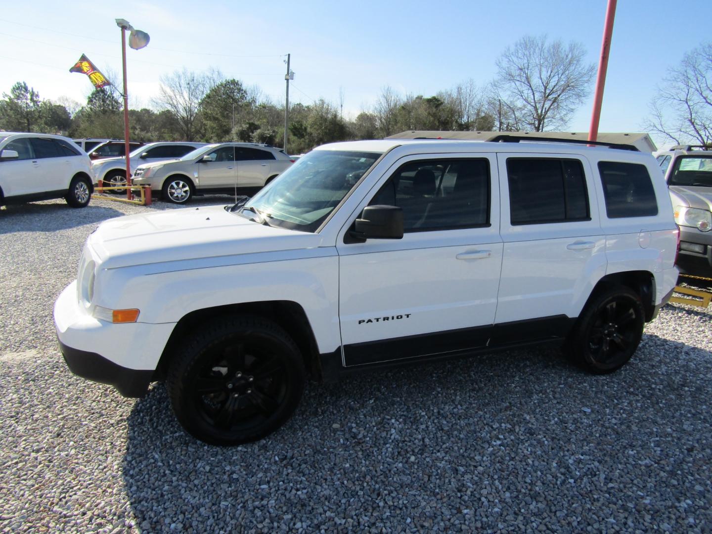 2015 White /Gray Jeep Patriot Sport 2WD (1C4NJPBA2FD) with an 2.0L L4 DOHC 16V engine, Automatic transmission, located at 15016 S Hwy 231, Midland City, AL, 36350, (334) 983-3001, 31.306210, -85.495277 - Photo#2